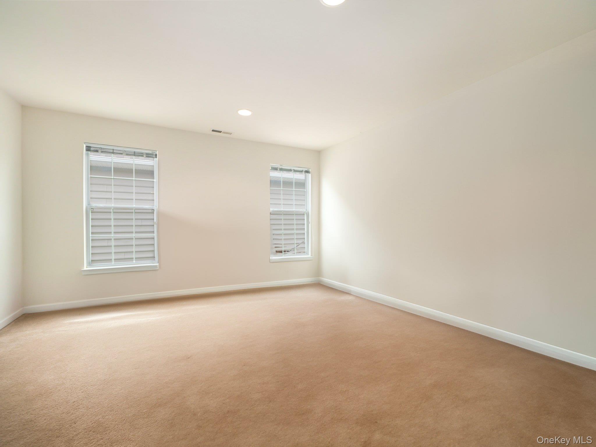 417 Vassar Place Fishkill, NY 12524 - Photo 25 of 38 an empty room with windows