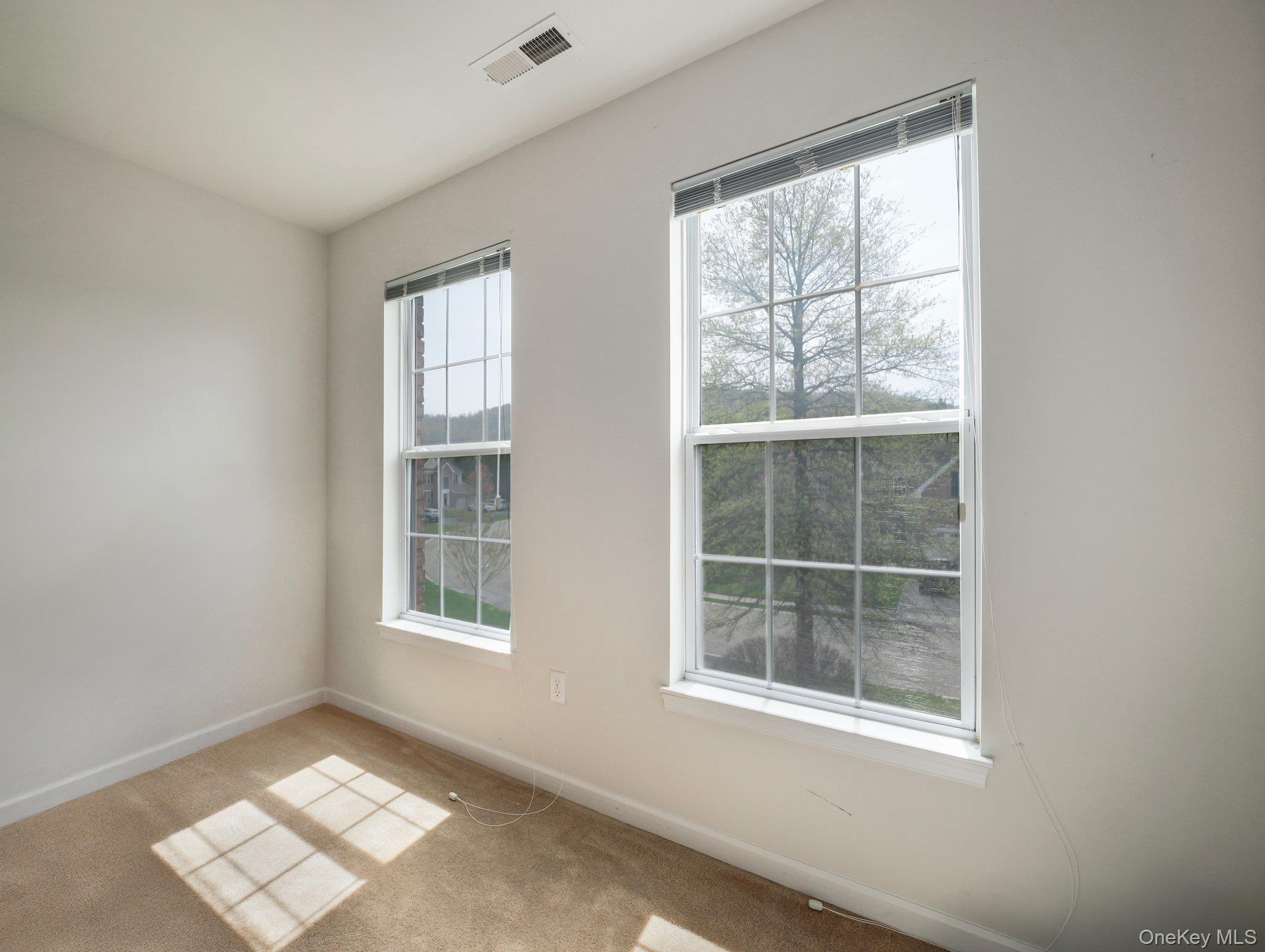 417 Vassar Place Fishkill, NY 12524 - Photo 31 of 38 an empty room with a window