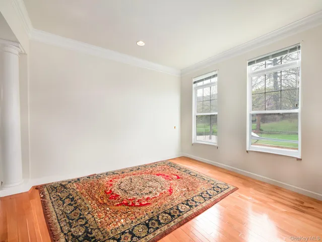 a view of a big room with windows