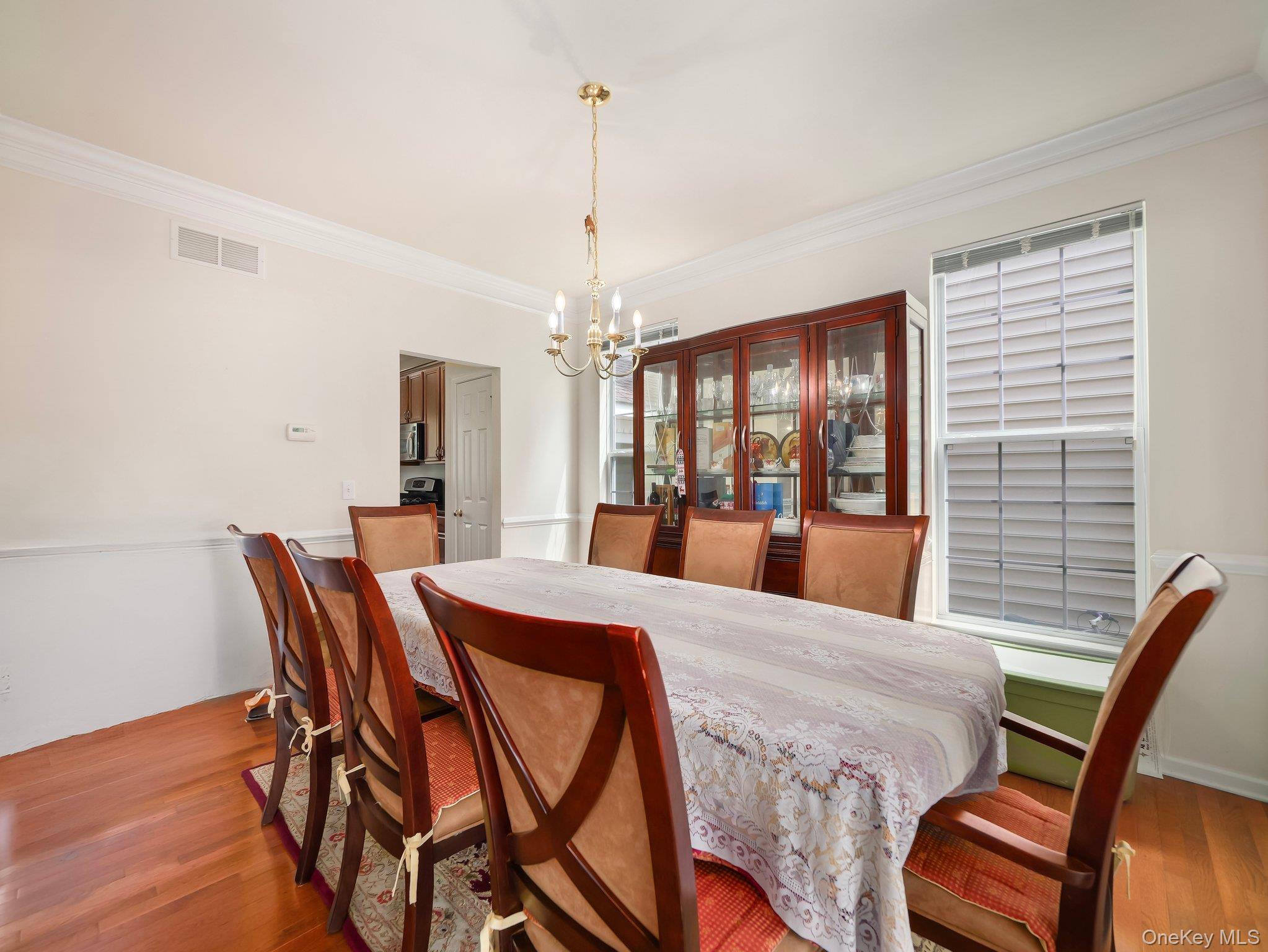 417 Vassar Place Fishkill, NY 12524 - Photo 6 of 38 a view of a dining room with furniture window and wooden floor