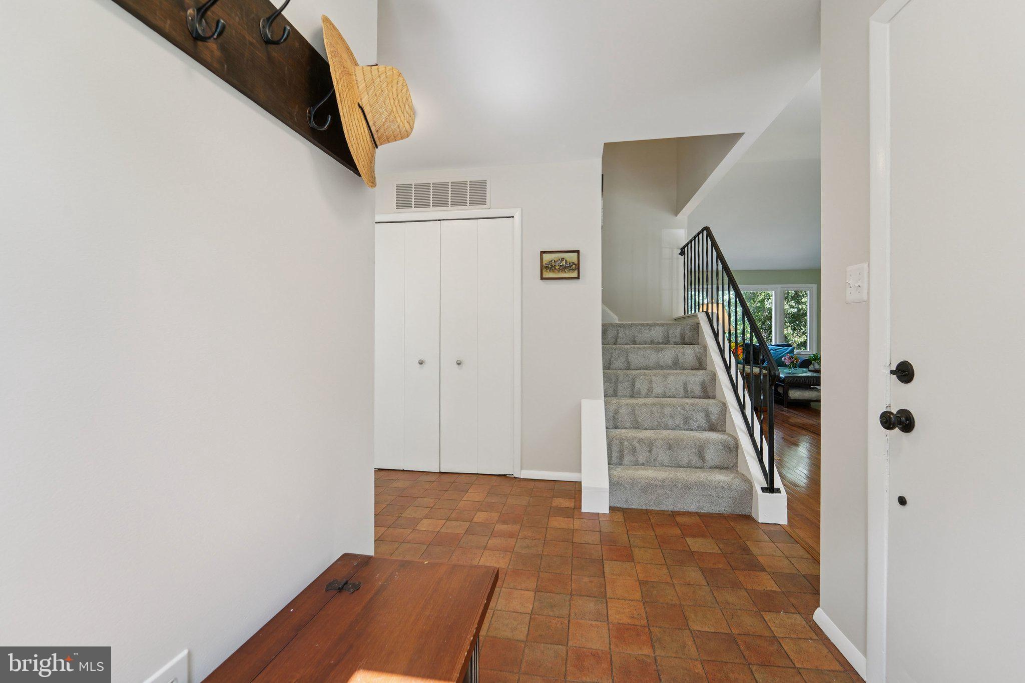 15108 Watergate Road Silver Spring, MD 20905 - Photo 13 of 33 a view of entryway and hall with wooden floor