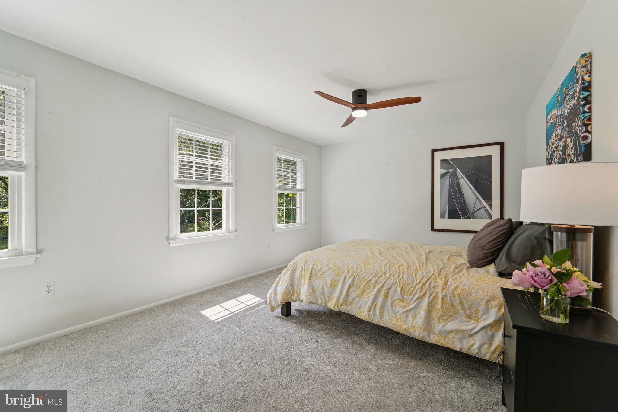 15108 Watergate Road Silver Spring, MD 20905 - Photo 15 of 33 a bedroom with a bed and window