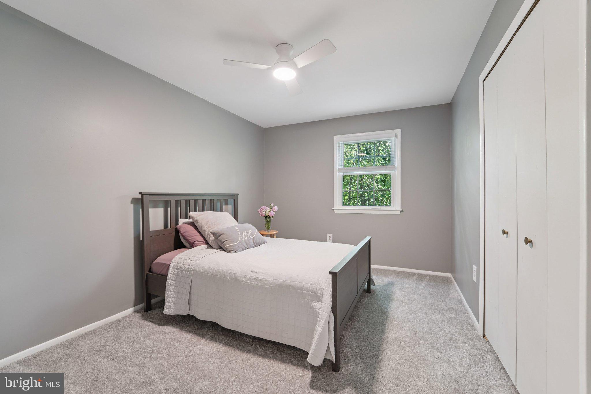 15108 Watergate Road Silver Spring, MD 20905 - Photo 19 of 33 a bedroom with a bed and window