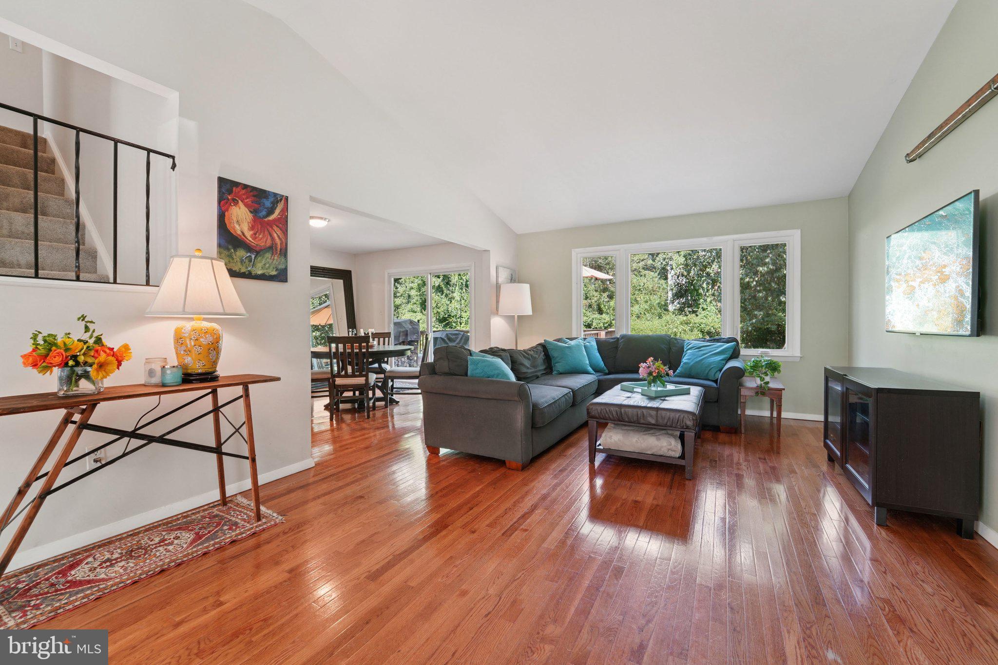 15108 Watergate Road Silver Spring, MD 20905 - Photo 2 of 33 a living room with furniture and wooden floor