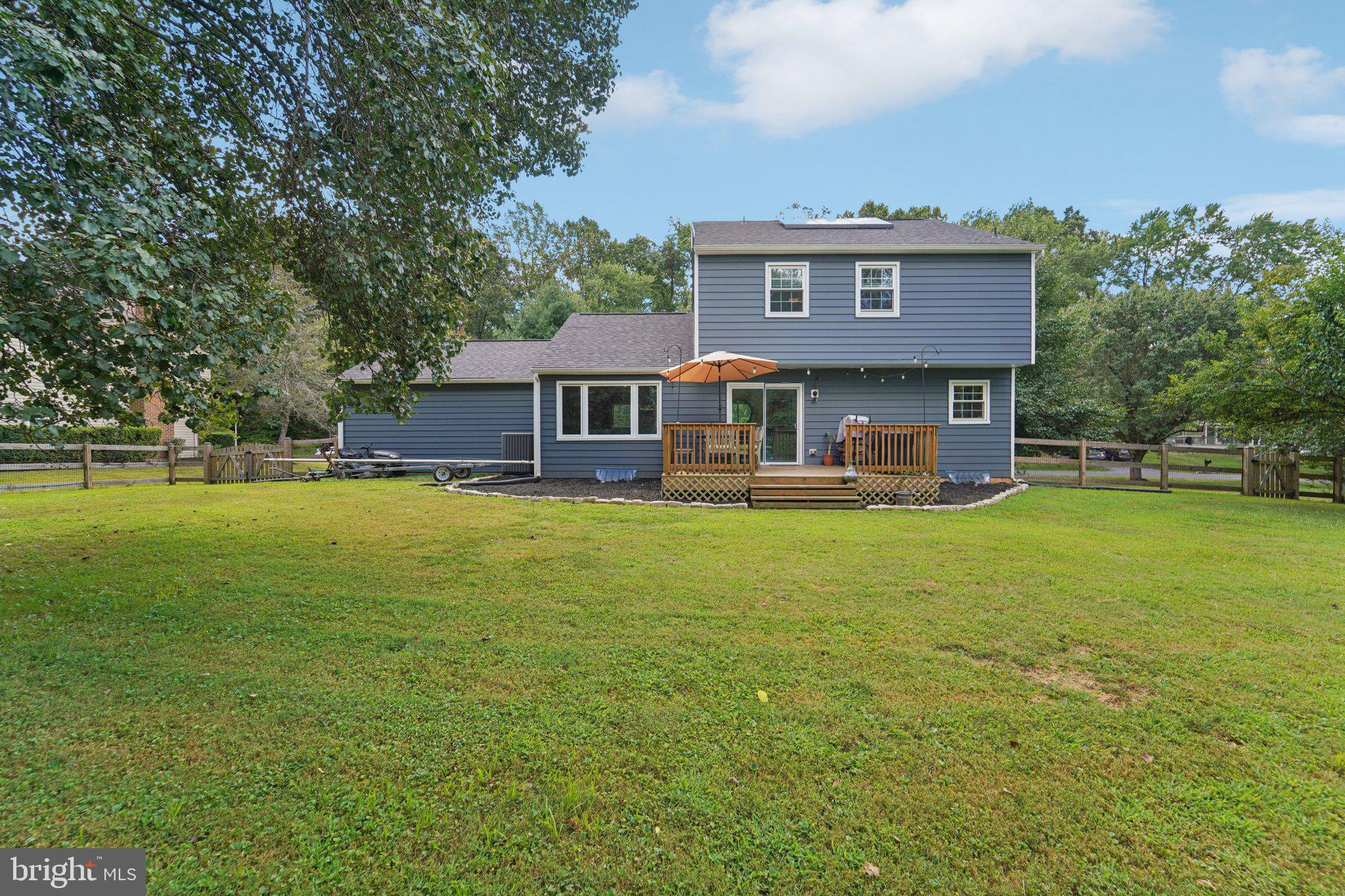 15108 Watergate Road Silver Spring, MD 20905 - Photo 25 of 33 a front view of house with yard and seating area
