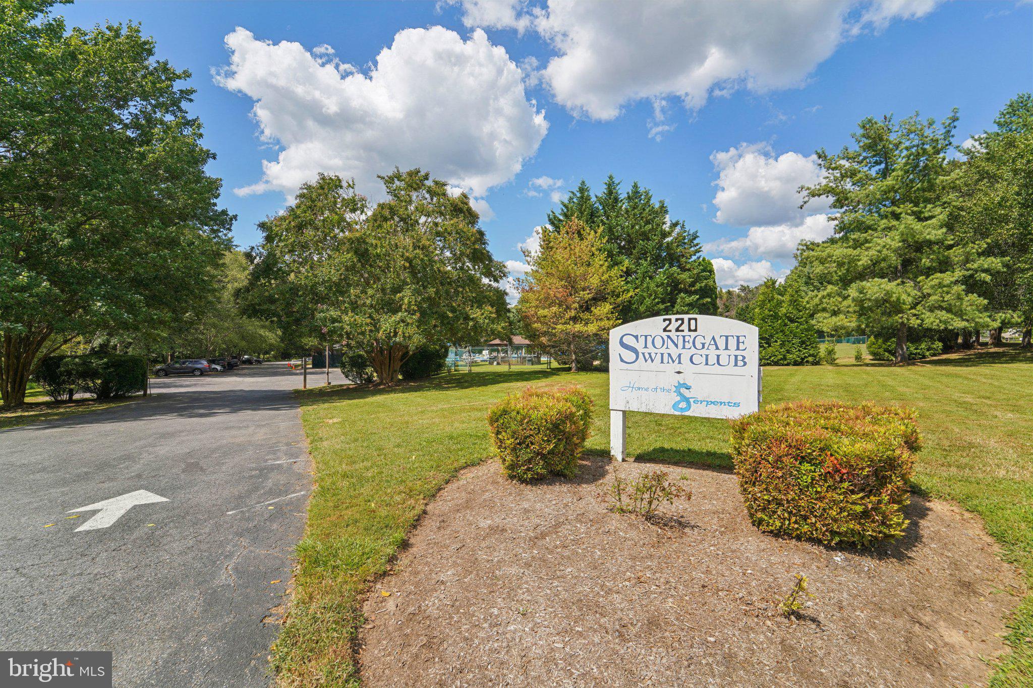 15108 Watergate Road Silver Spring, MD 20905 - Photo 31 of 33 a sign board with a big yard