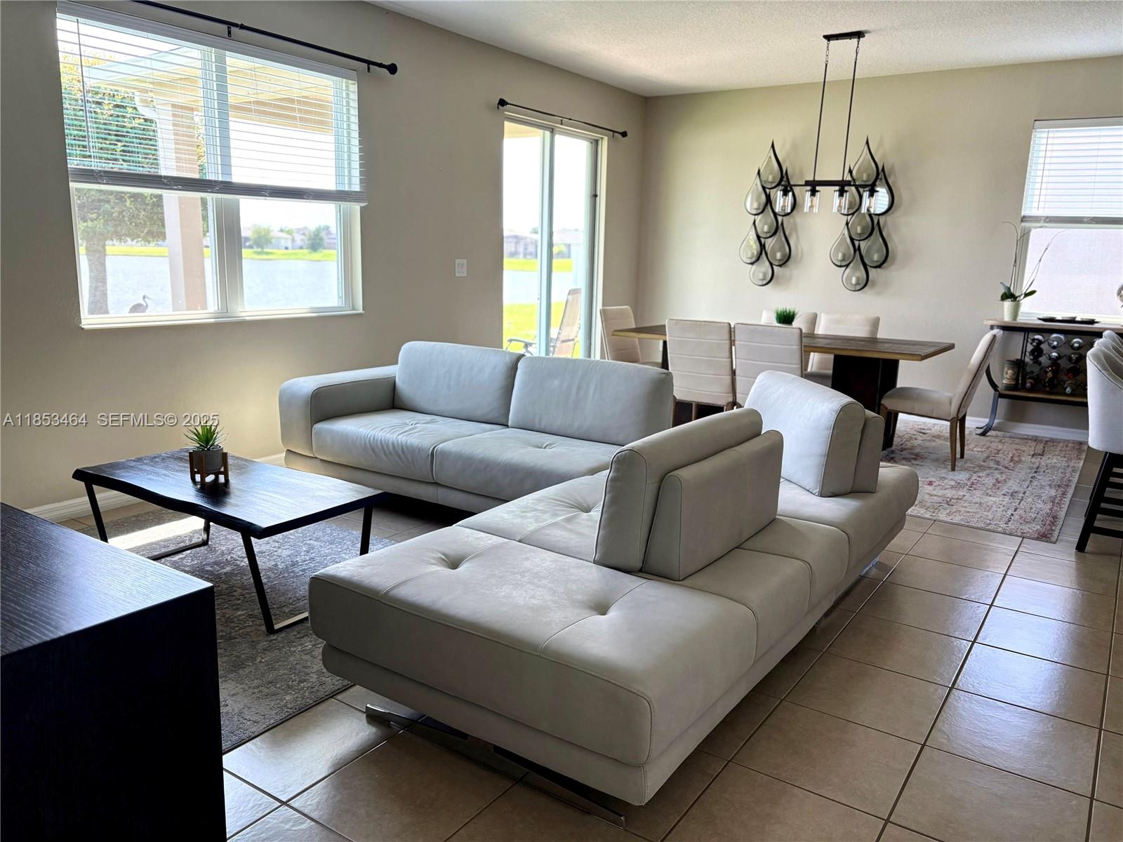 4582 Baler Trails Drive St. Cloud, FL 34772 - Photo 5 of 27 a living room with furniture and a window
