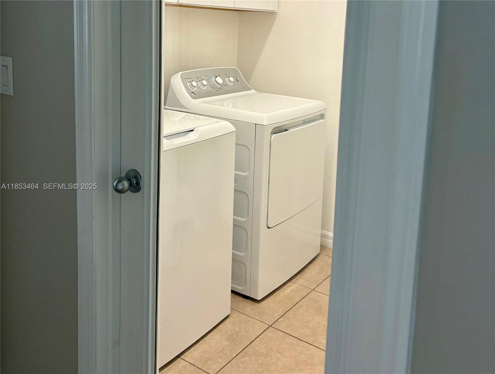 4582 Baler Trails Drive St. Cloud, FL 34772 - Photo 10 of 27 a utility room with washing machine