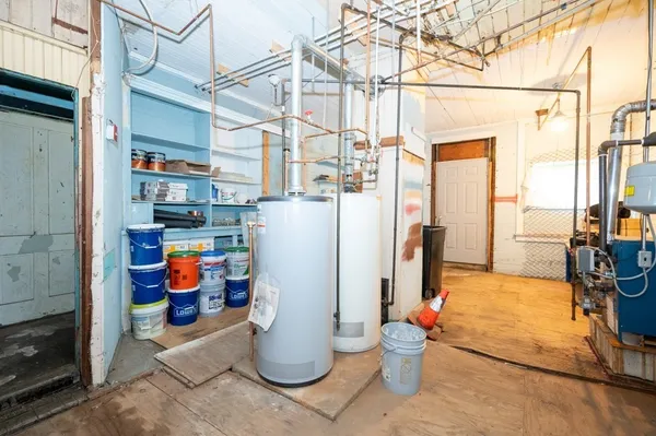 a view of a storage & utility room with stuff