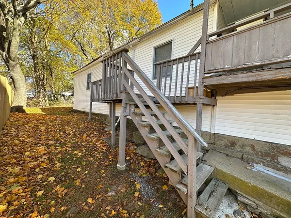 a house with trees in front of it