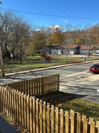 a view of a yard with an ocean view