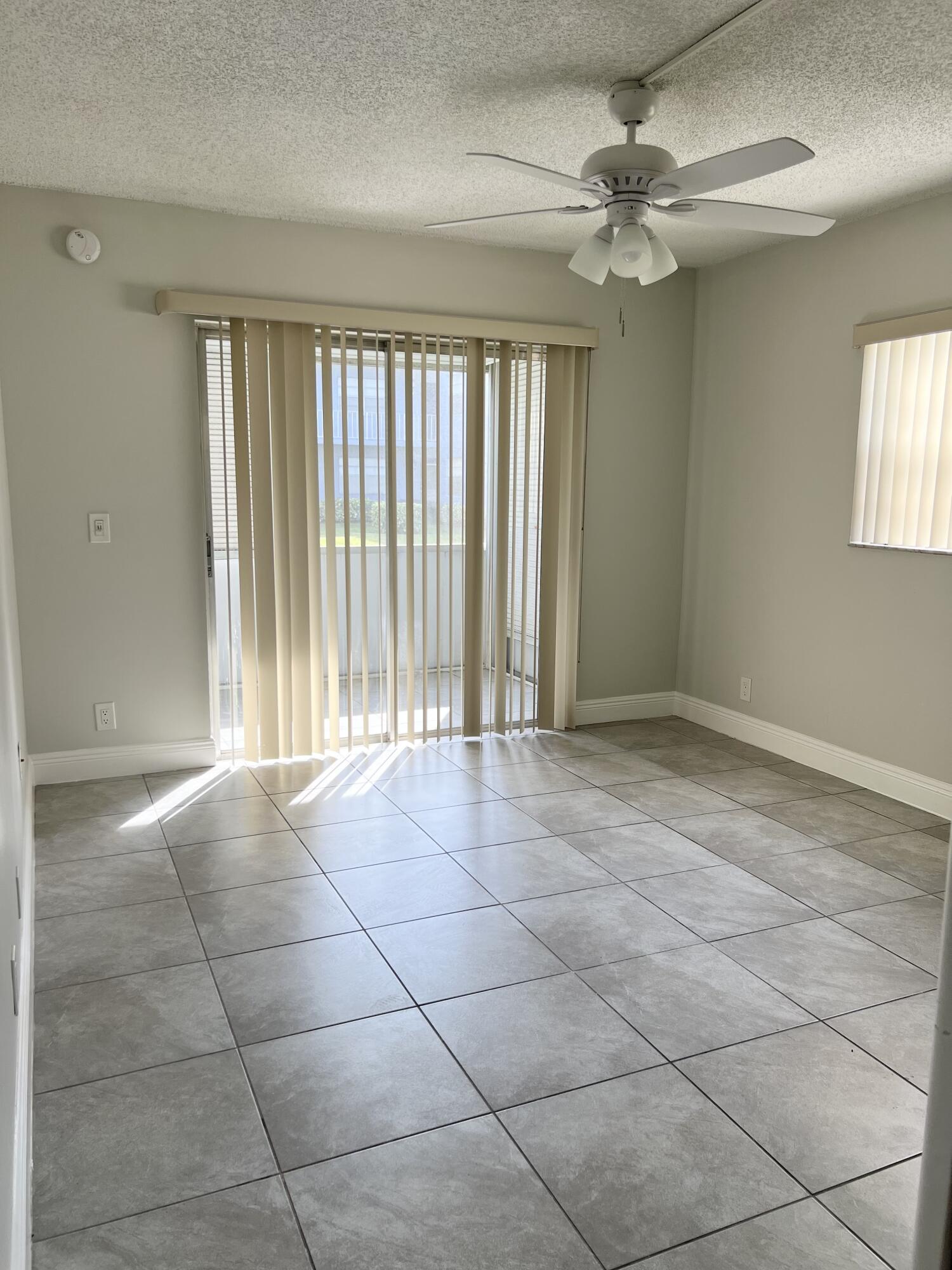 150 Burgandy Way, Unit D Delray Beach, FL 33484 - Photo 15 of 33 a view of an empty room with a window