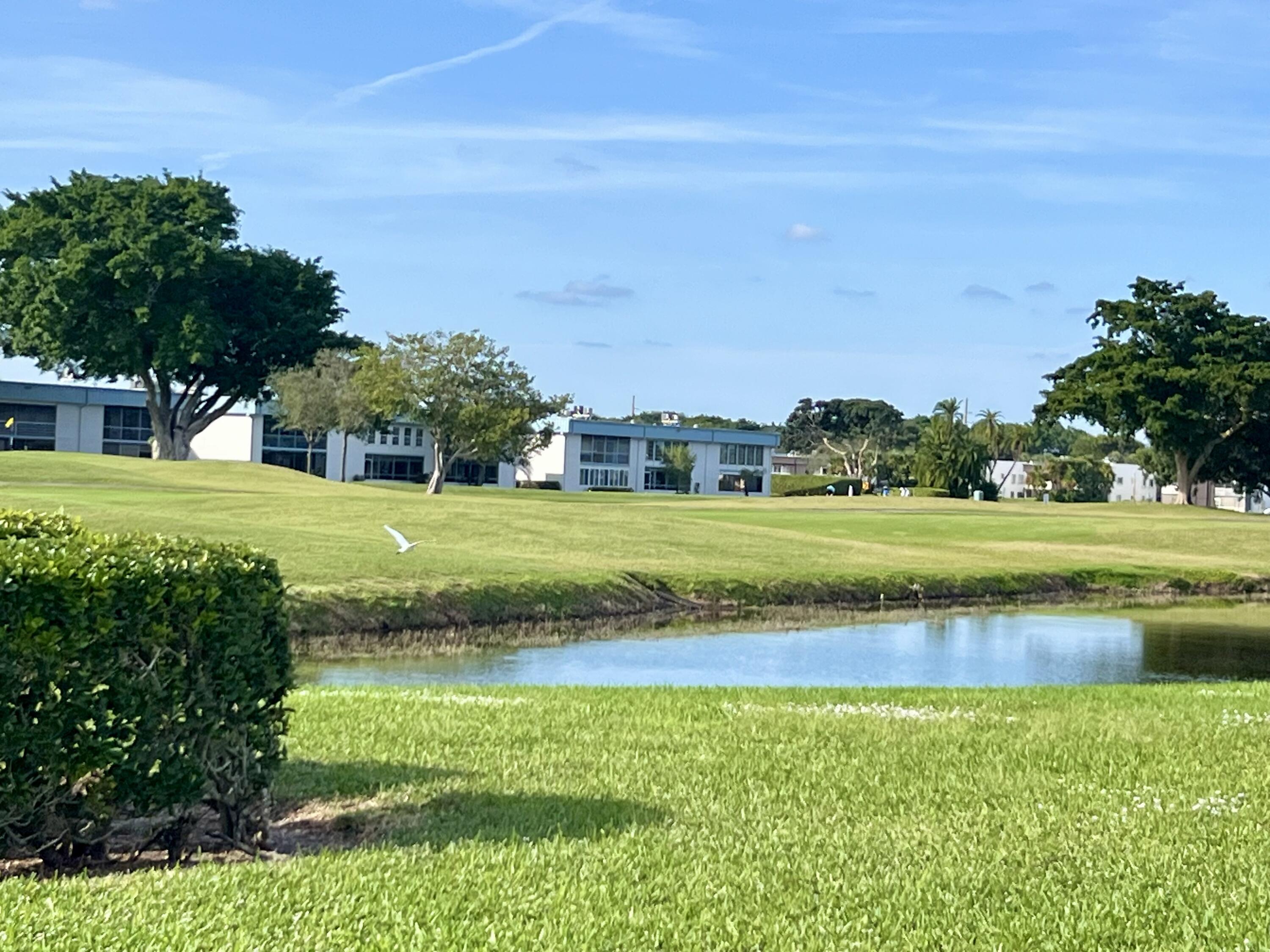 150 Burgandy Way, Unit D Delray Beach, FL 33484 - Photo 20 of 33 a view of a golf course