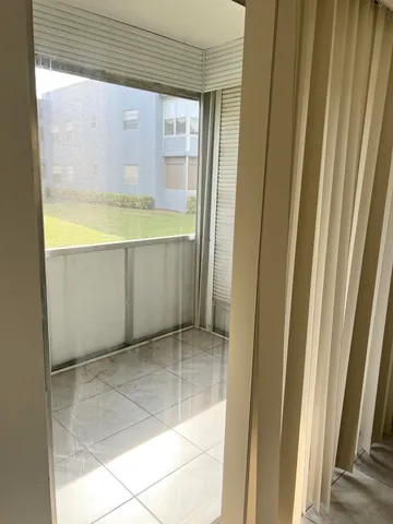 a view of walk in closet with window