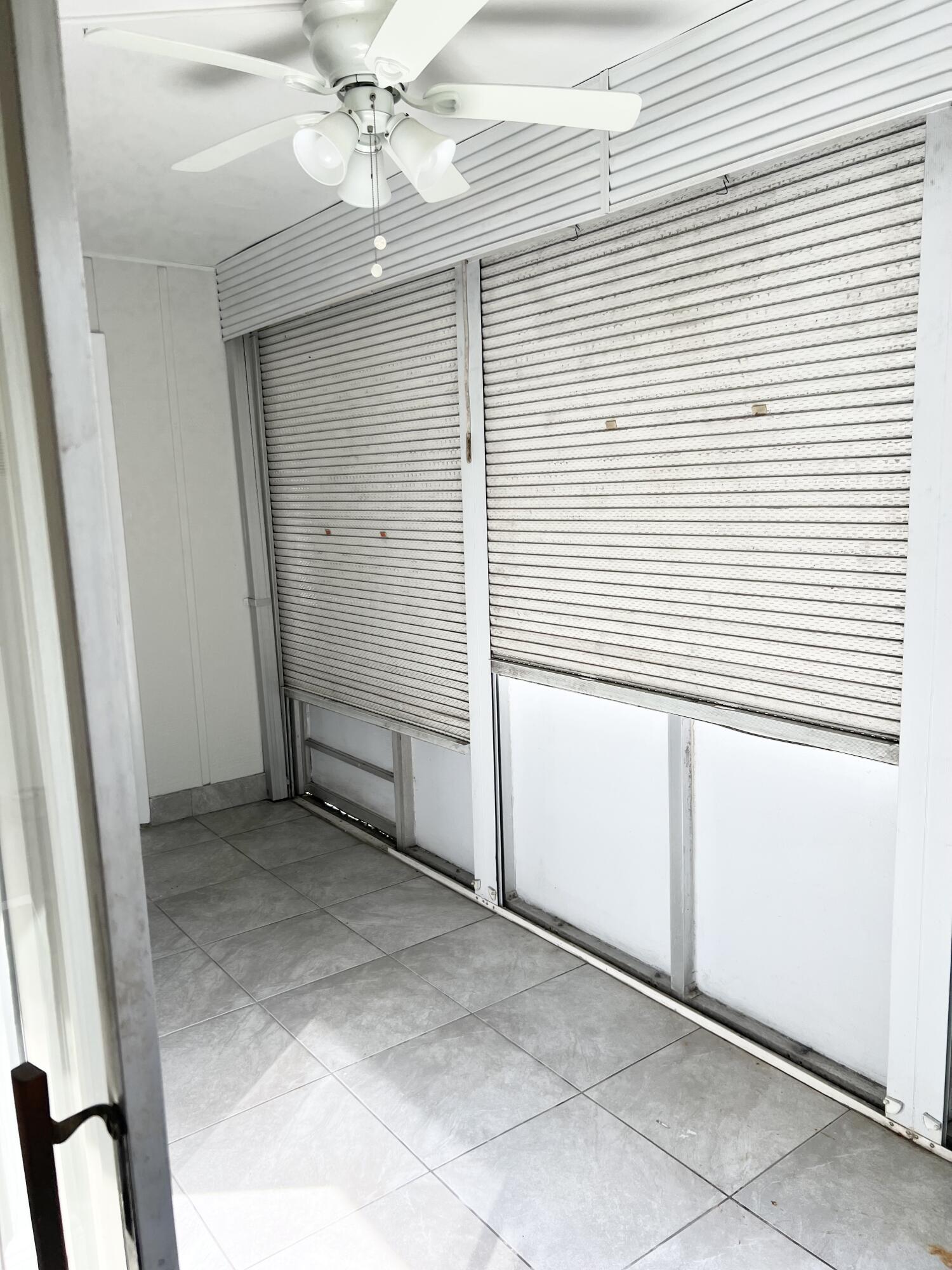 150 Burgandy Way, Unit D Delray Beach, FL 33484 - Photo 24 of 33 a view of a livingroom with an entryway
