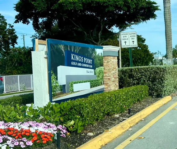 a sign on the side of the road