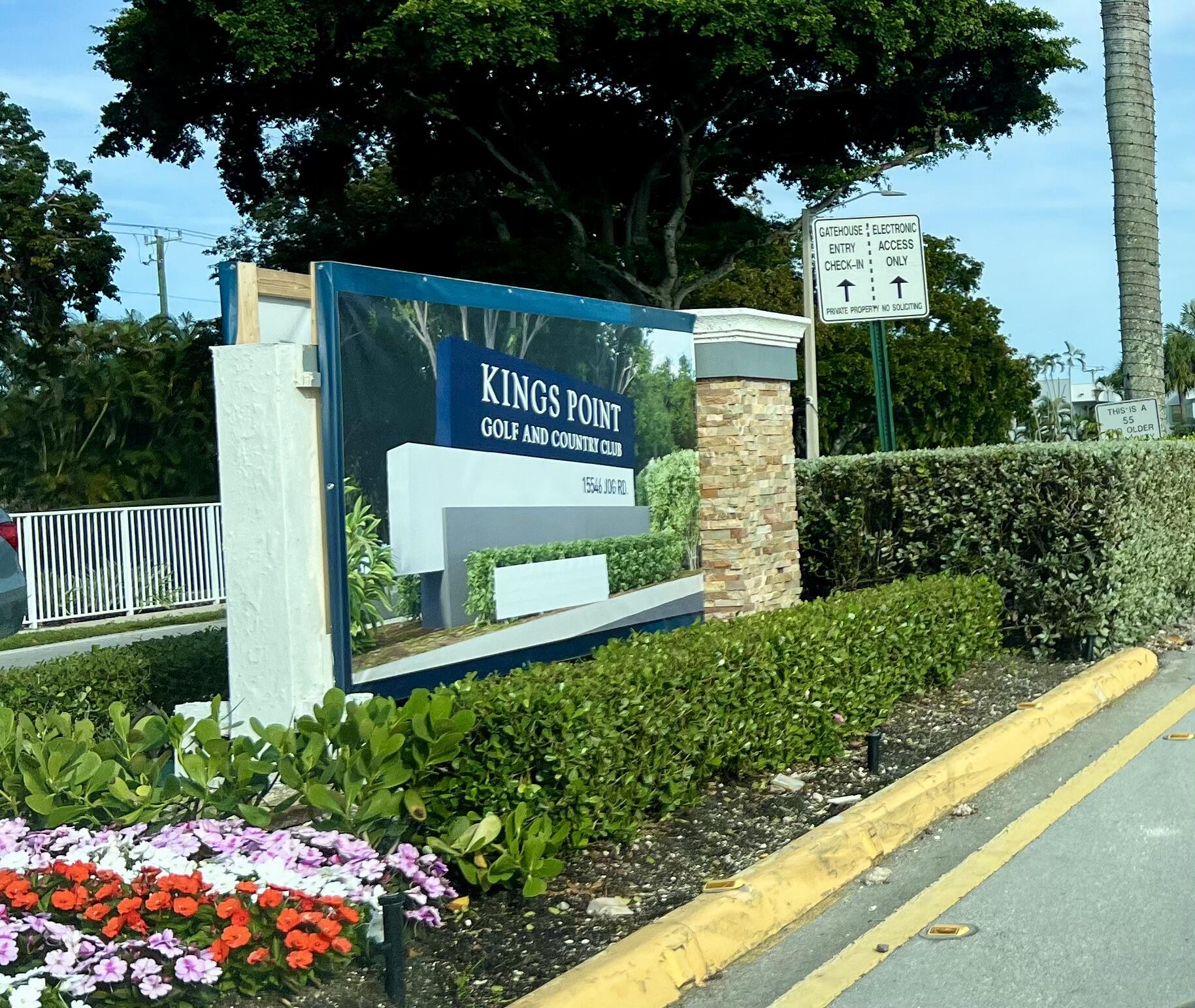 150 Burgandy Way, Unit D Delray Beach, FL 33484 - Photo 26 of 33 a sign on the side of the road