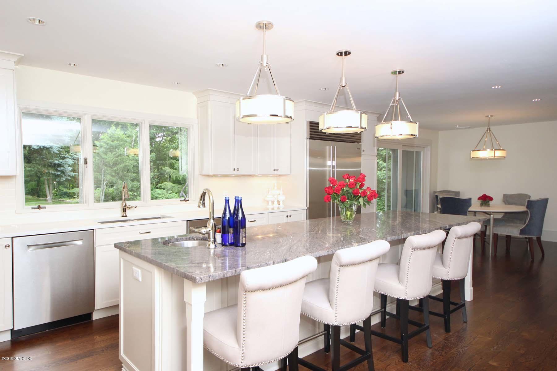 55 Cutler Road, Unit MAIN HOUSE Greenwich, CT 06831 - Photo 5 of 18 a view of a dining room with furniture window and outside view