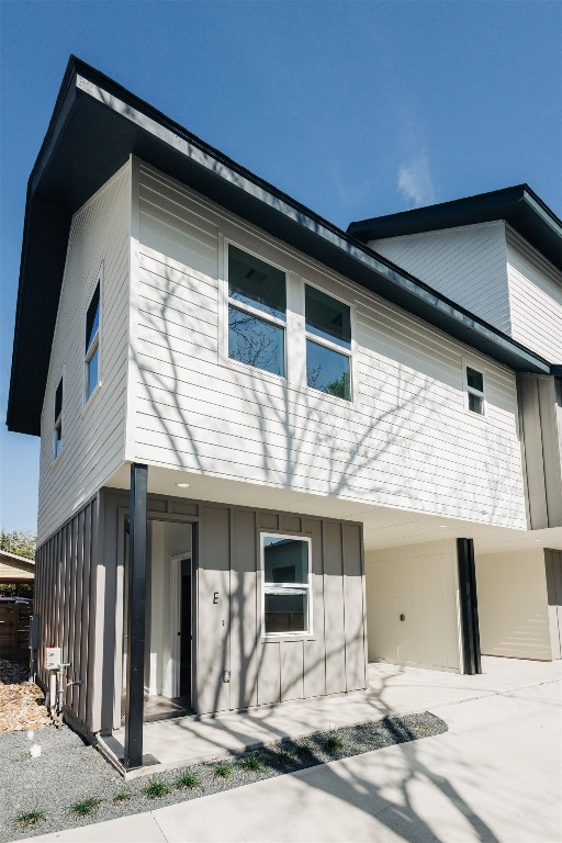 4700 Prock Lane, Unit E Austin, TX 78721 - Photo 1 of 1 a front view of a house with a garage