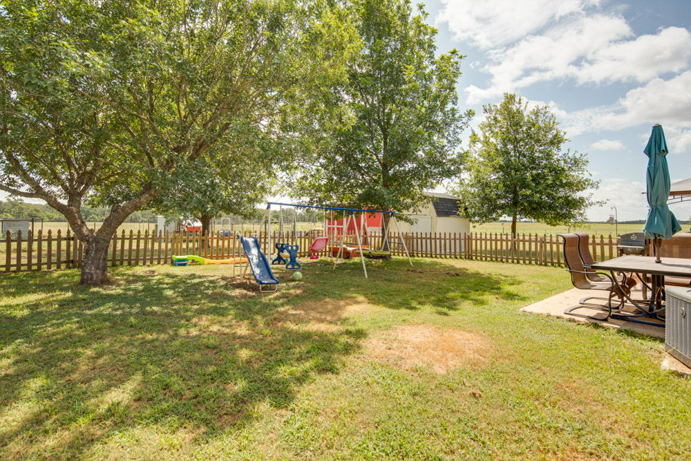 978 Holly Cemetery Road Franklin, TX 77856 - Photo 20 of 33 Fenced in portion of the yard, accessible from the backdoor.