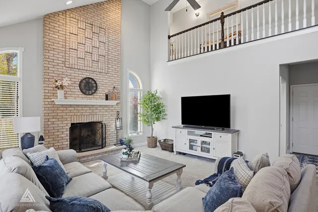 a bedroom with furniture and windows