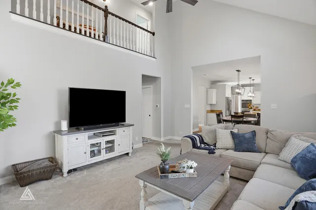 a bathroom with double vanity sink a mirror and a toilet
