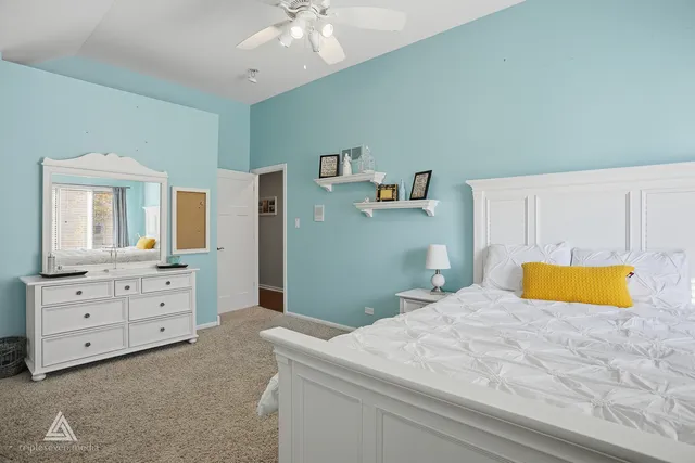 a bathroom with a toilet a sink and a mirror