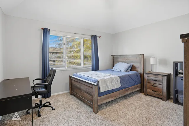 a view of a chairs and table in the patio
