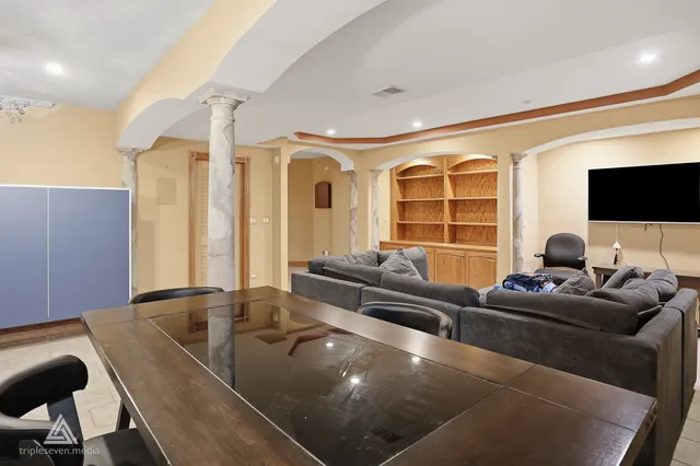 a view of a park with large trees