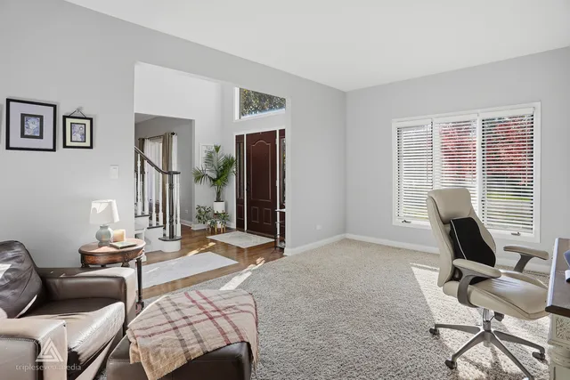 a kitchen with stainless steel appliances granite countertop cabinets and refrigerator
