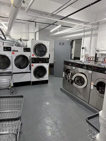 a view of livingroom with furniture and window