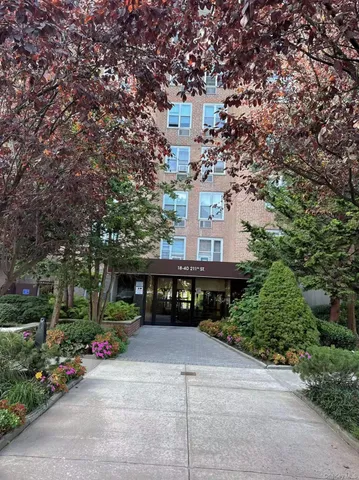 a front view of house with a yard