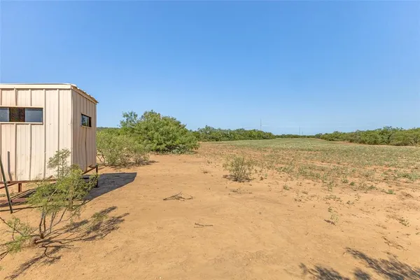 a view of an ocean with beach
