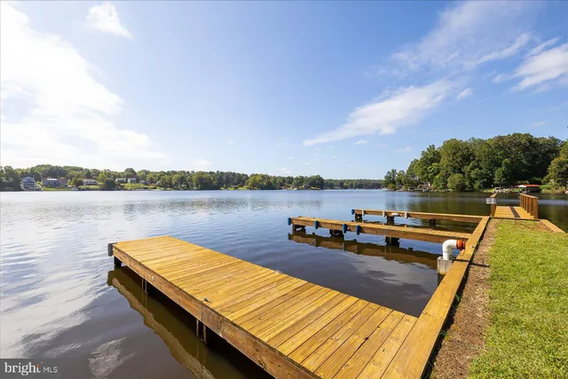 a view of swimming pool with a lake