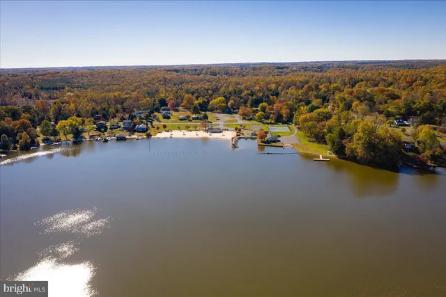 a view of small pool with chairs