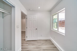3623 A 3rd Avenue Glendale, CA 91214 - Photo 10 of 20 a view of an empty room with wooden floor and a window