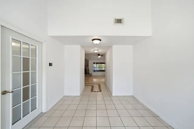 a view of an empty room and window
