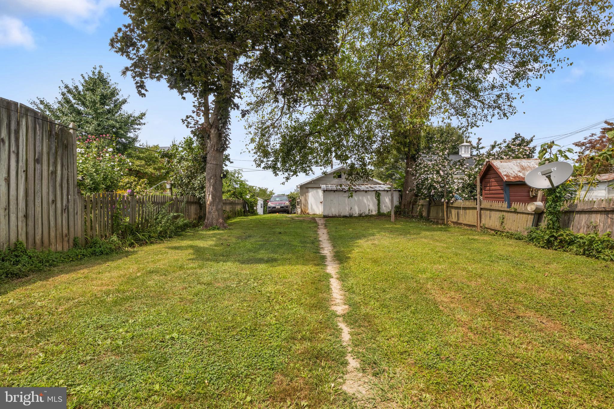 216 Main Street New Windsor, MD 21776 - Photo 12 of 16 a view of a house with yard and sitting area