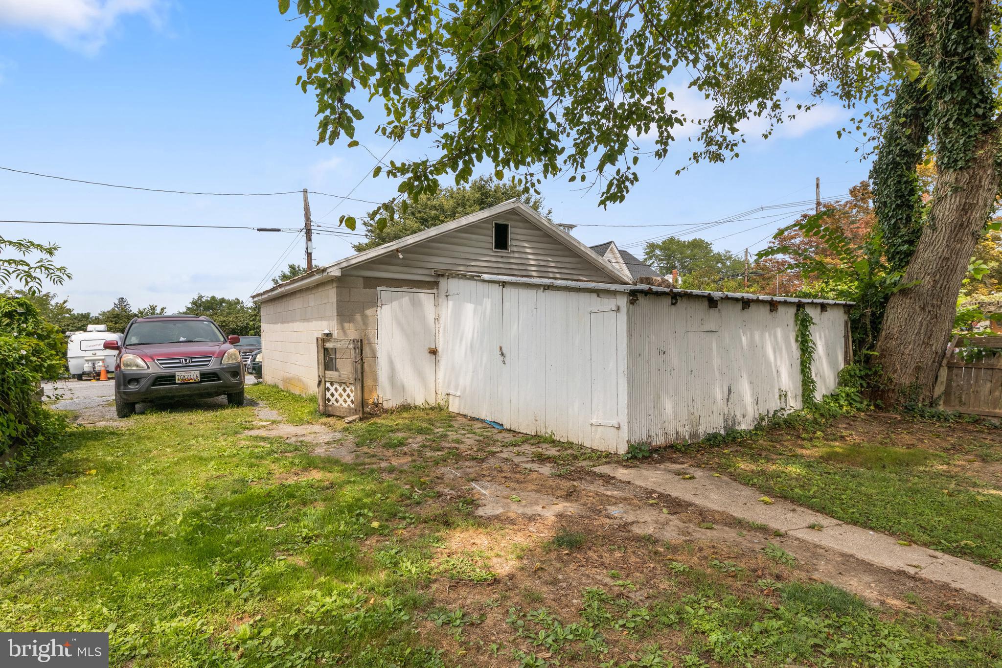 216 Main Street New Windsor, MD 21776 - Photo 13 of 16 a house view with a garden