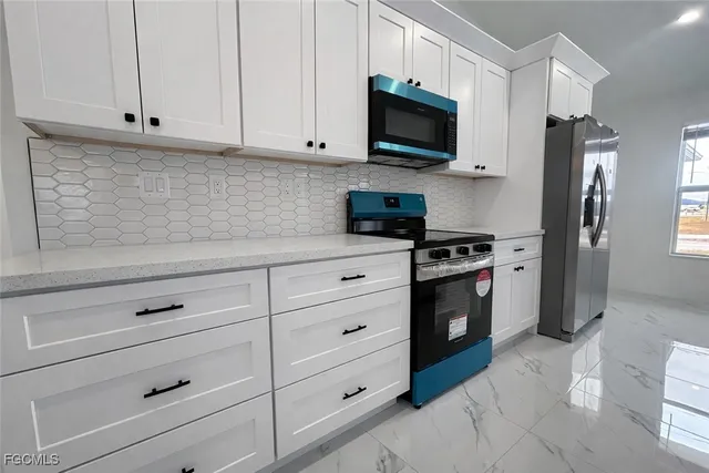 $1,945 | 649 Wilmington Parkway, Cape Coral, FL 33993