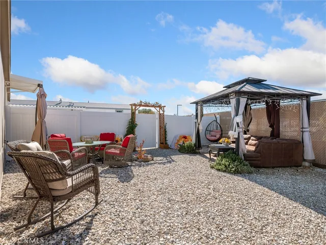 a view of a living room and a car parked beside it