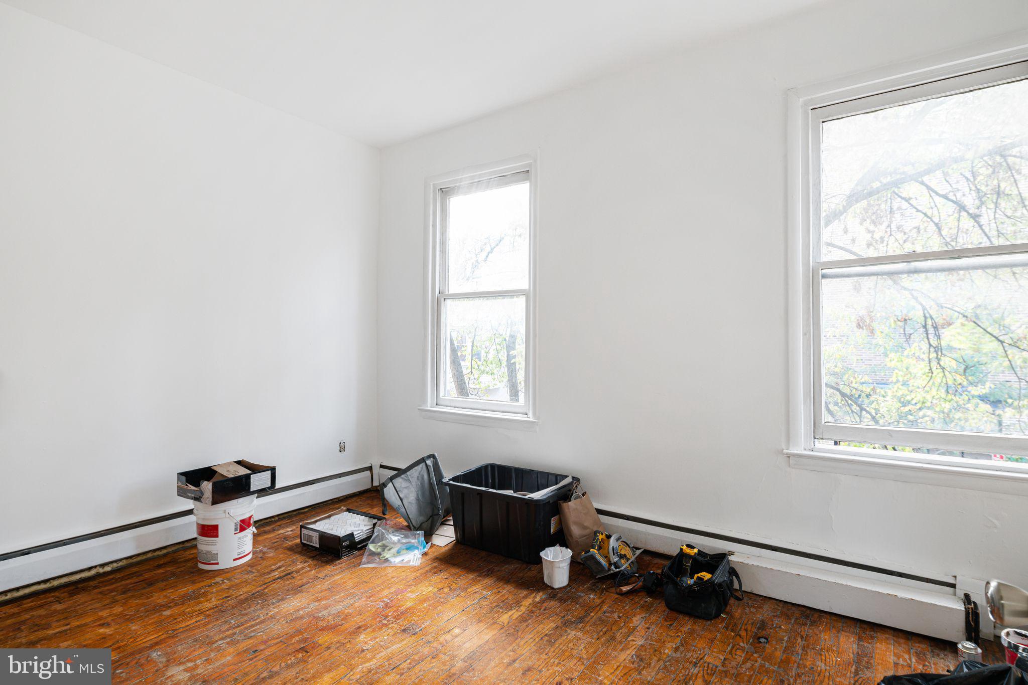 417 South 16th Street, Unit 2 Philadelphia, PA 19146 - Photo 3 of 10 a room with a window and wooden floor