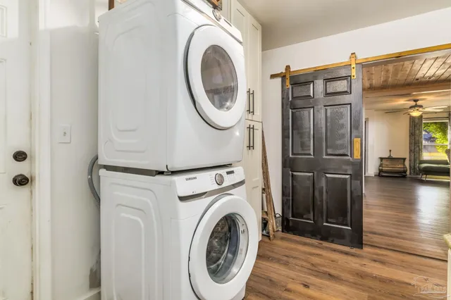 a utility room with dryer and washer
