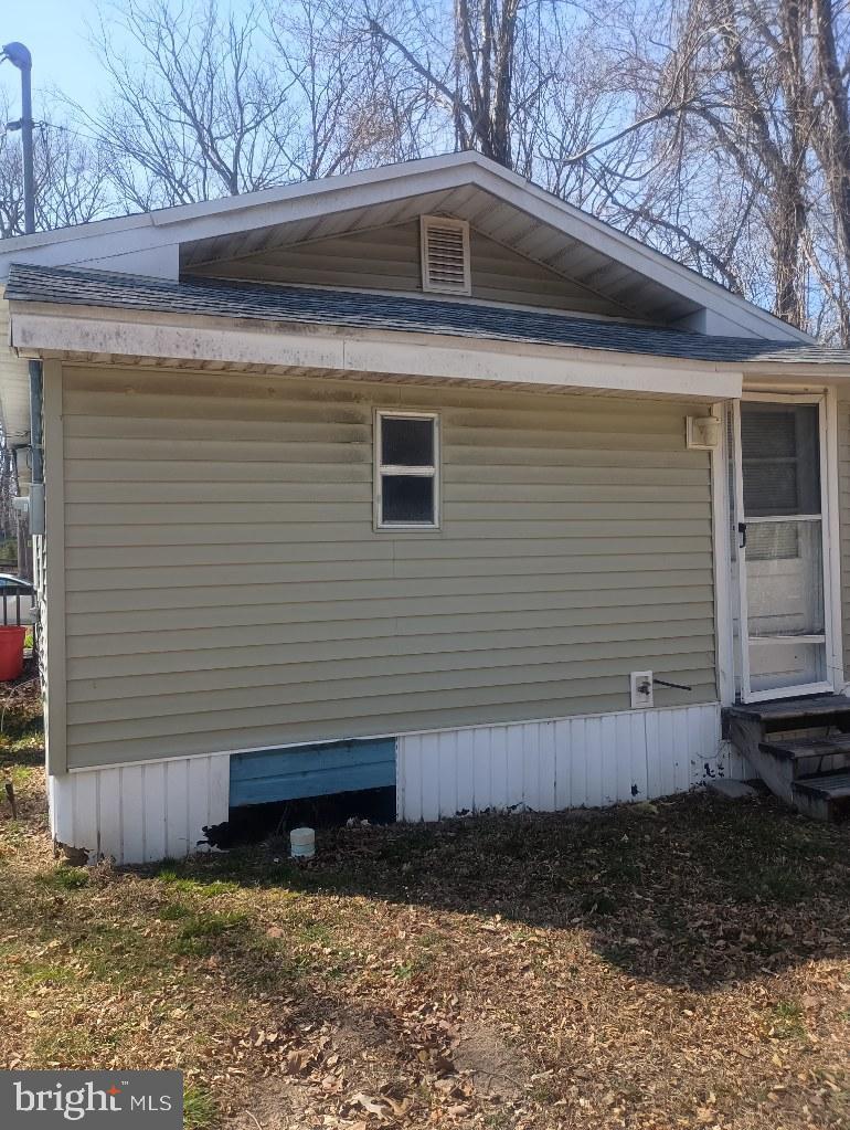 138 Jute Road Millville, NJ 08332 - Photo 8 of 12 a view of a house with a yard