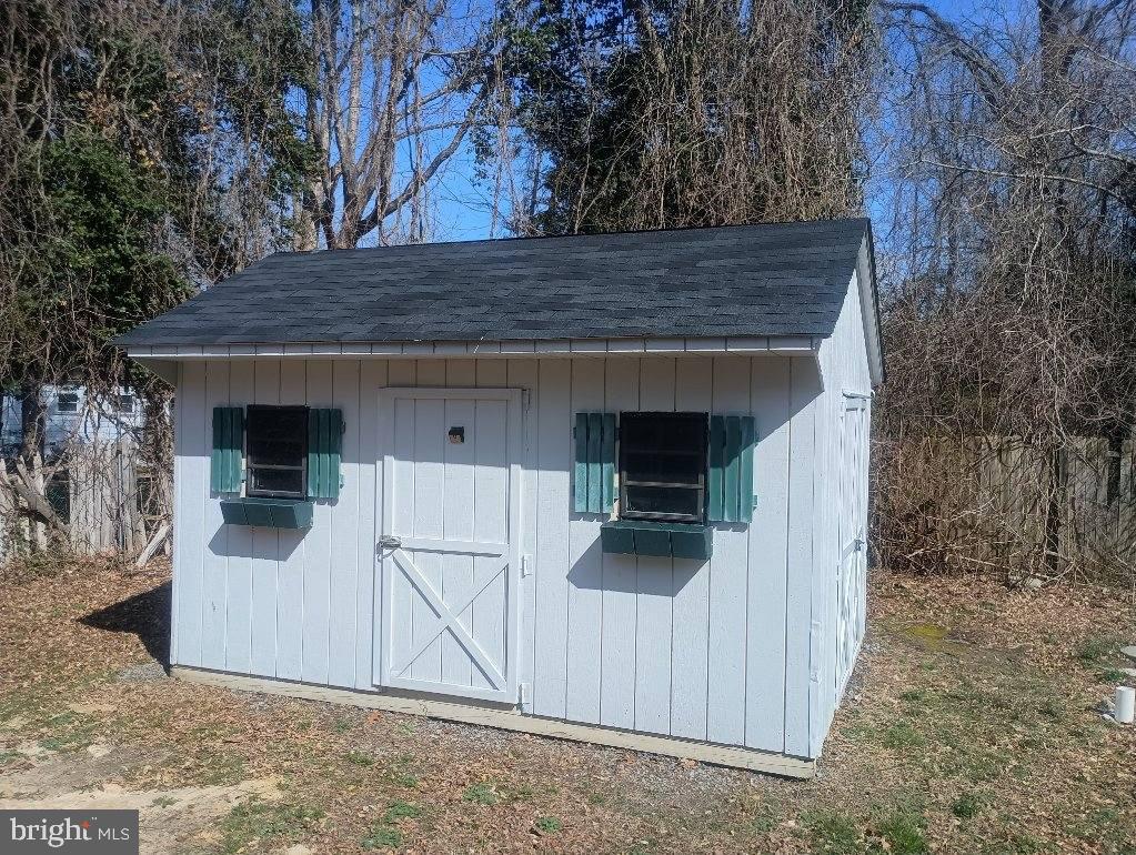 138 Jute Road Millville, NJ 08332 - Photo 10 of 12 a view of a house with a barn
