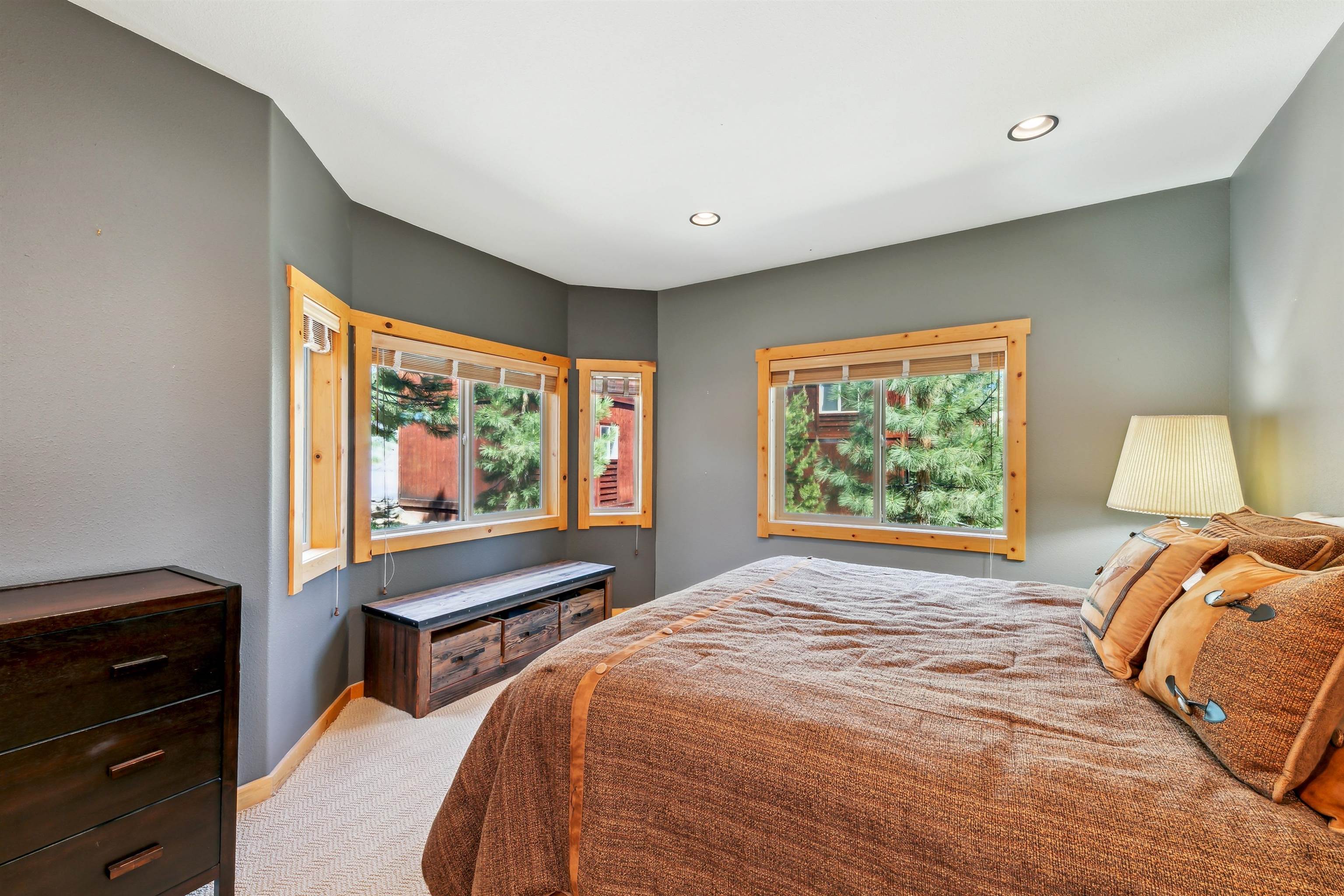 12391 Stockholm Way Truckee, CA 96161 - Photo 22 of 28 a bedroom with a bed and a flat screen tv
