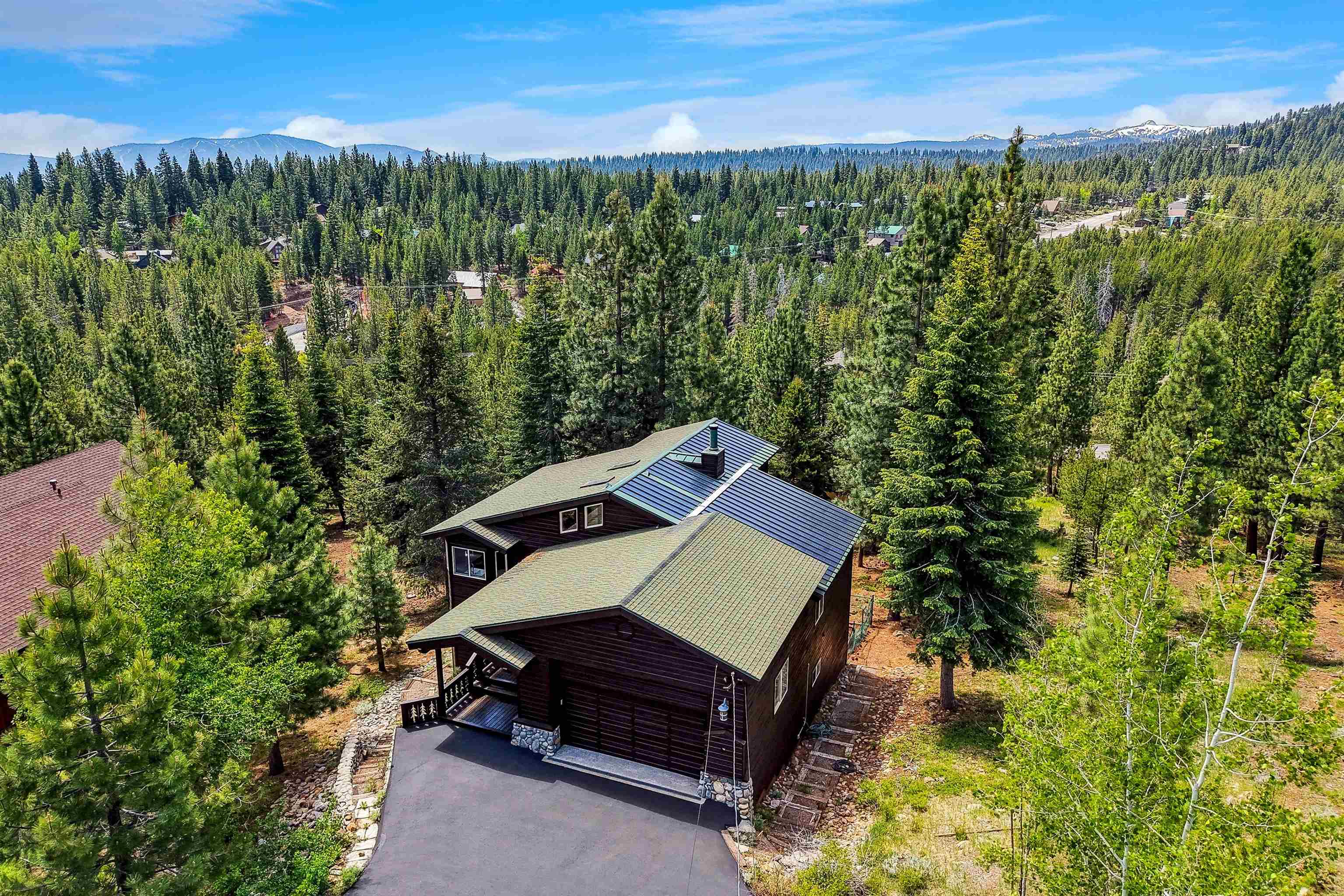 12391 Stockholm Way Truckee, CA 96161 - Photo 4 of 28 a view of a two chairs in the roof deck