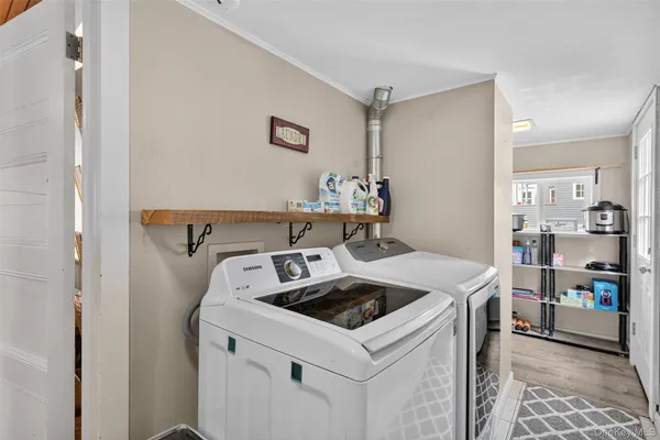 a utility room with washer and dryer