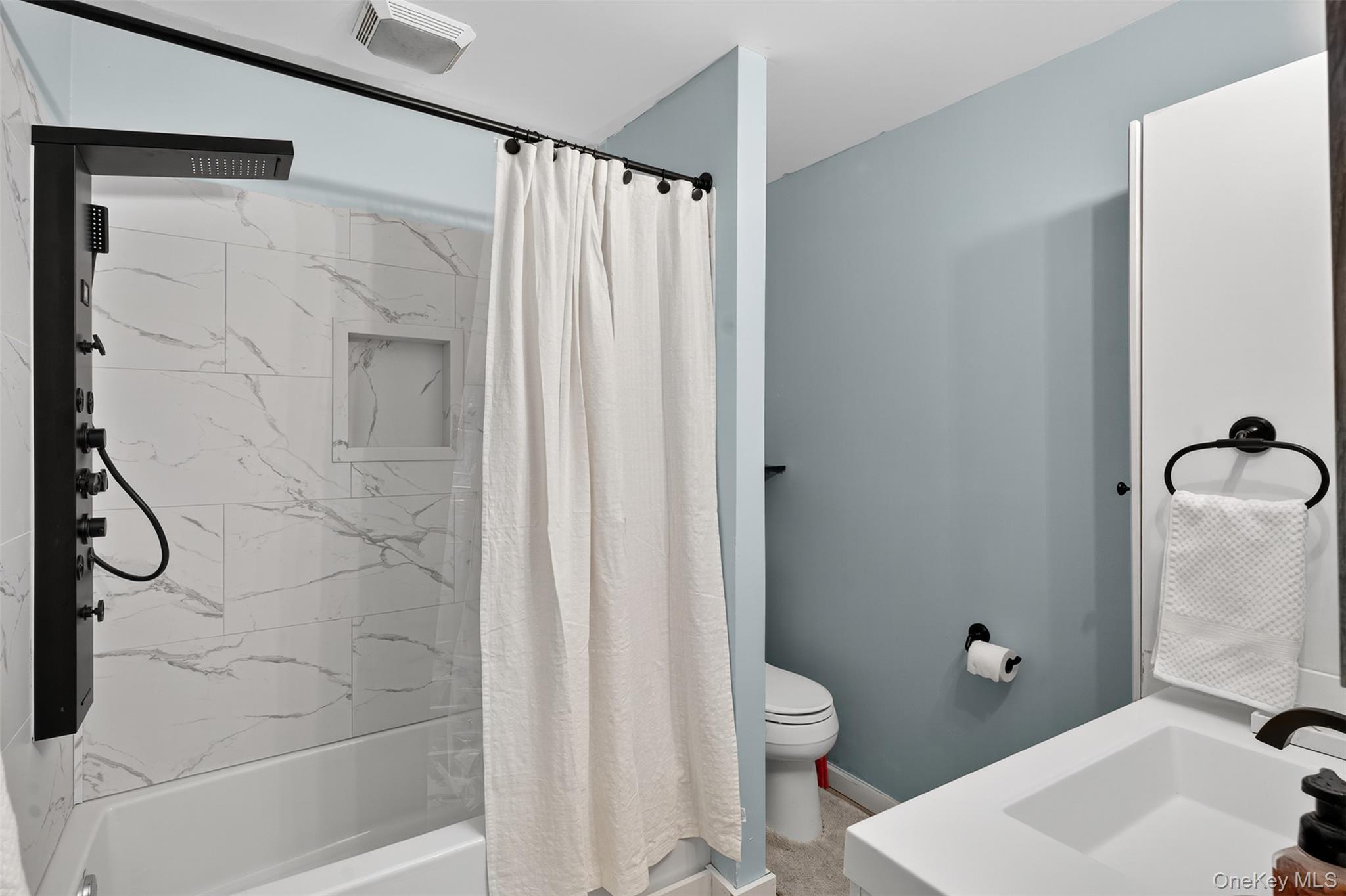 5 Bede Terrace Cornwall, NY 12518 - Photo 20 of 25 a bathroom with a shower curtain and a sink