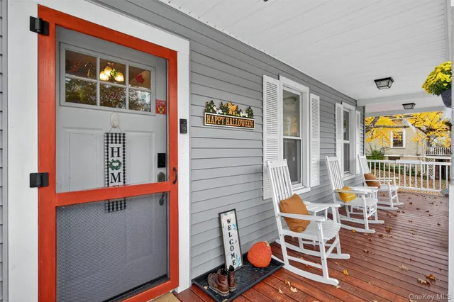 a outdoor space with a large window and chair
